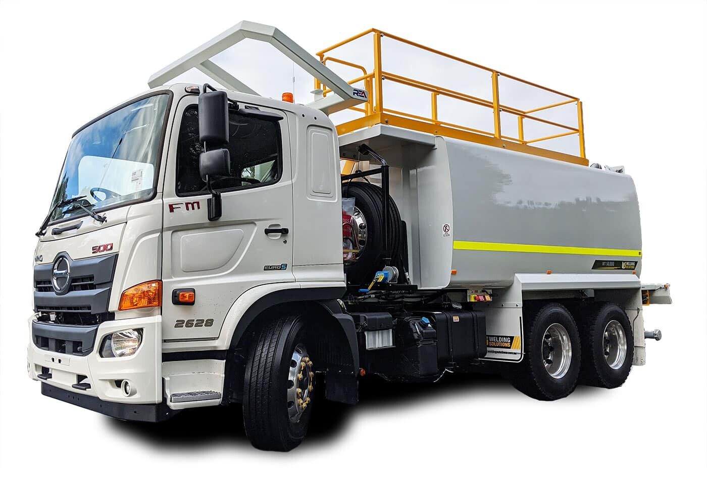 White fuel truck with yellow safety railings.